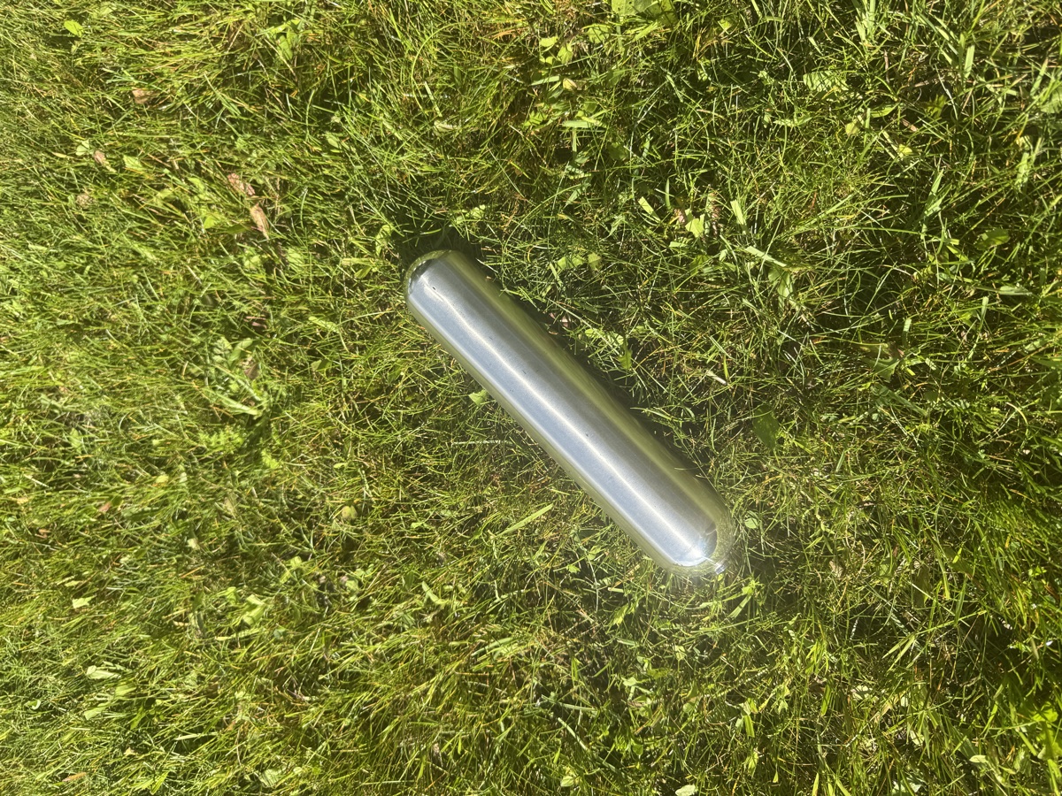 Polished cylindrical stainless steel oblong float