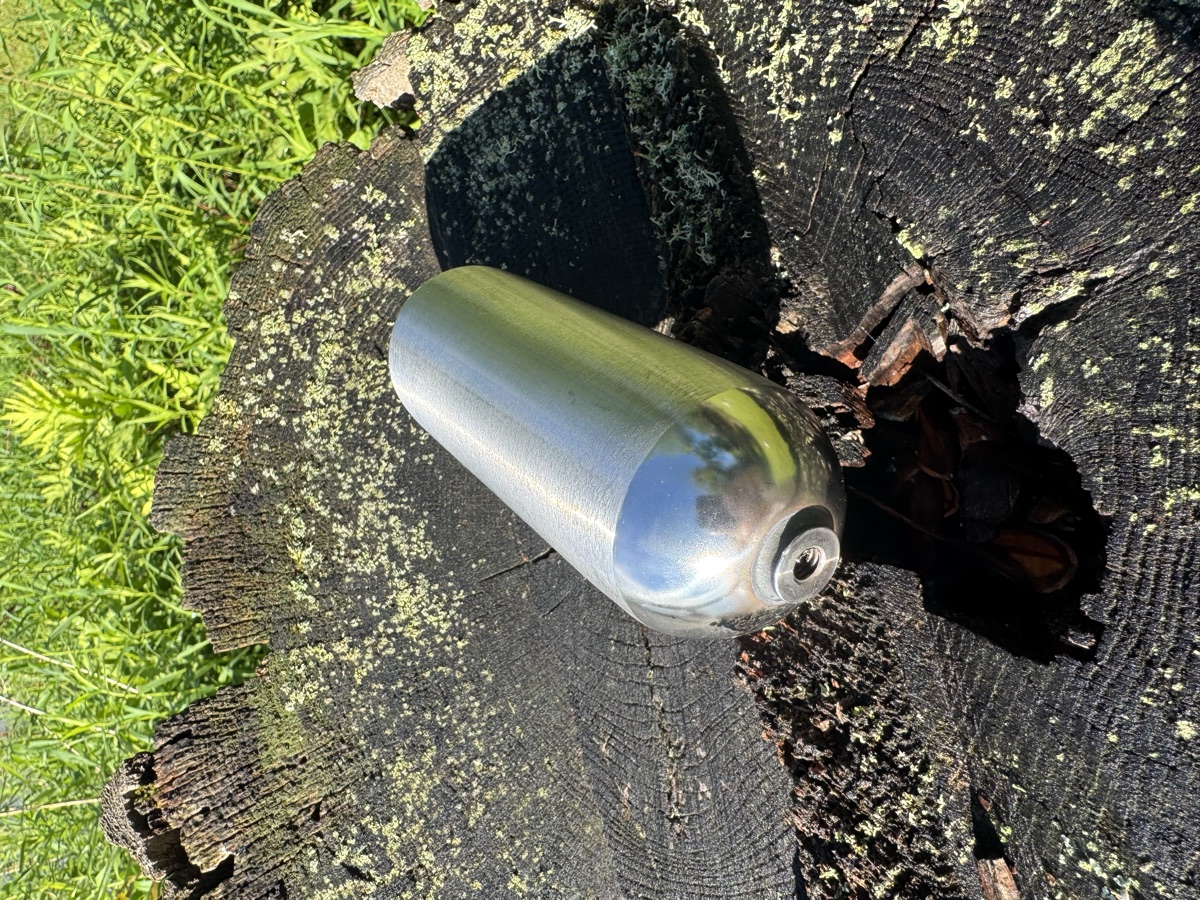 Brushed-finish stainless steel oblong float